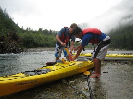 Pumping out the kayak